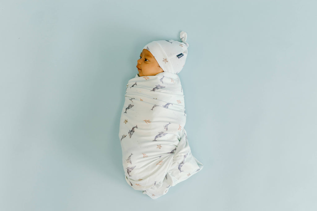 Unwrapping the Benefits of Swaddling