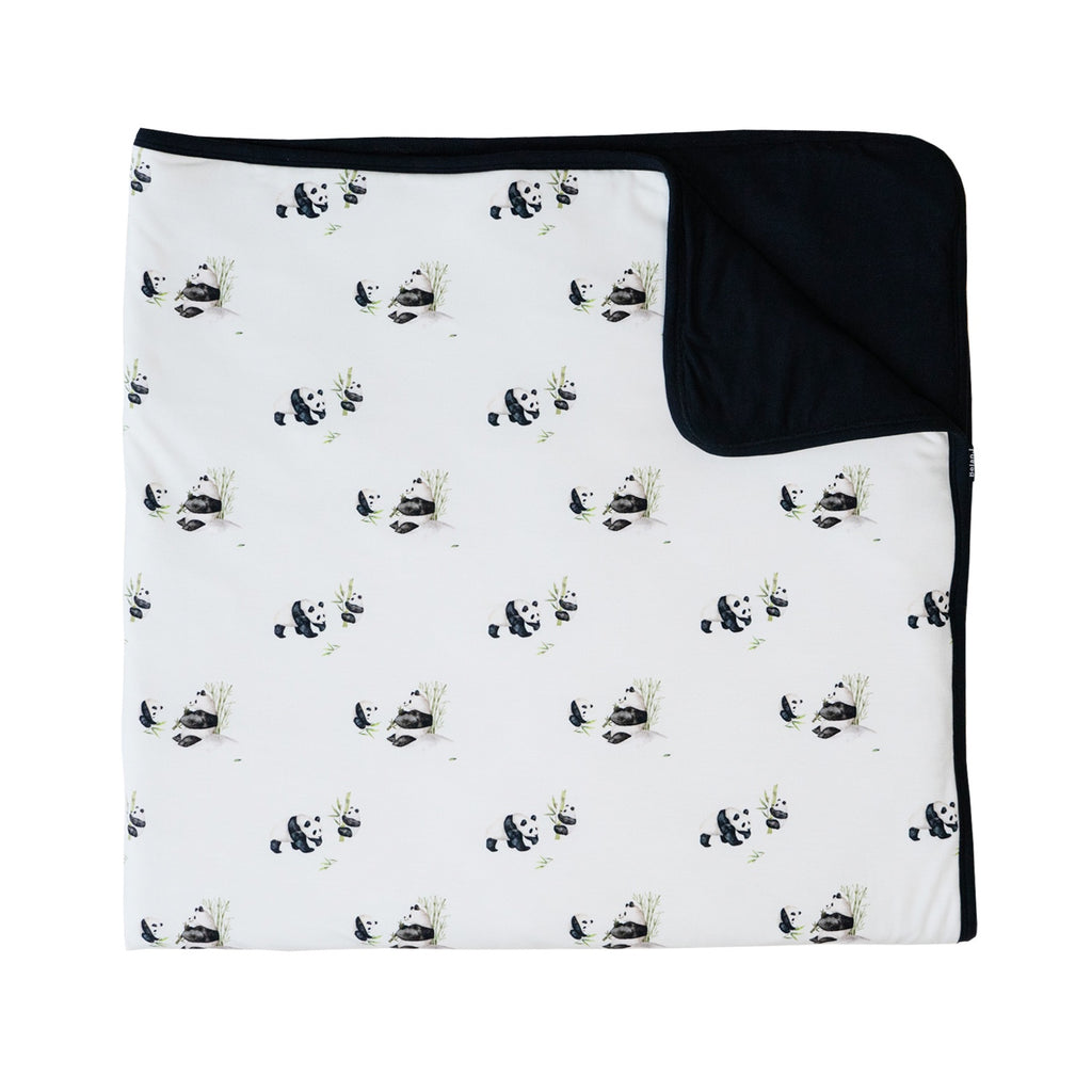 quilted child blanket in pandas print, with black color inside